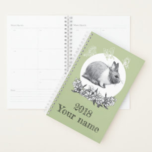 Agenda Lebre fluffy com borboletas em fundo verde