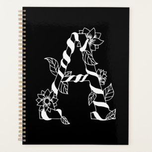 Agenda Letra negra e branca "A" com flores geminadas