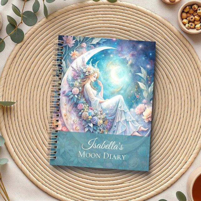 Agenda Lunar Sonha Fada Planner (Lunar Dreams Fairy Planner on a boho table with eucalyptus and a cup of tea.)