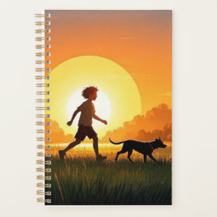 Agenda Menino jovem com cachorro no pôr do sol