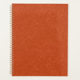 Agenda Orange textured surface with swirling pattern