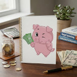 Agenda Pink Pig Holding Cash Giving Thumbs Up<br><div class="desc">Organize your path to prosperity with this rich pink pig spiral planner. The cover features a winking cartoon mascot holding money and giving a thumbs up, providing daily motivation as you track your appointments and financial goals. This high quality planner is perfect for students, business professionals, or anyone managing a...</div>
