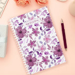 Agenda Purple Watercolor Floral Personalizado<br><div class="desc">Crie um refúgio personalizado para seus planos e sonhos com esse planejador personalizável, adornada em um design floral de aquarela cativante. As matizes roxas suaves criam um pano de fundo sereno para suas músicas diárias, enquanto a opção de adicionar seu nome ou iniciais o torna exclusivamente seu. Mantenha-se organizado e...</div>