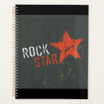 Agenda Rock Star Distressed Grunge Red Star<br><div class="desc">Organize your gigs, rehearsals, and daily tasks in this rock star vintage grunge spiral planner. The cover displays a heavily distressed red star and retro typography, offering a cool and professional look for musicians and creative thinkers. Inside, you will find plenty of space to track your schedule, set goals, and...</div>