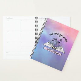 Agenda Rosa Blumen, die aus Buch wachsen