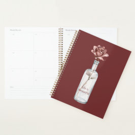 Agenda Rosa Vermelha em Garrafa
