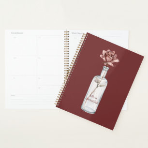 Agenda Rosa Vermelha em Garrafa