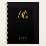 Agenda Script Dourado e preto monograma moderno<br><div class="desc">Escrito monograma de ouro minimalista contra fundo preto. Personalize facilmente o nome e o monograma da escolha na frente e no verso.</div>