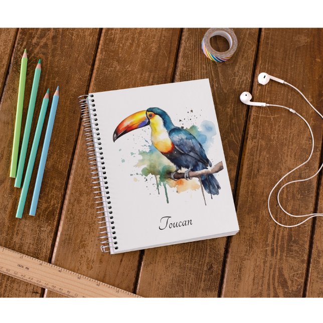 Agenda tucano colorido sentado num galho (Criador carregado)