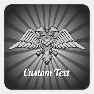 Águia cinza com dois adesivos