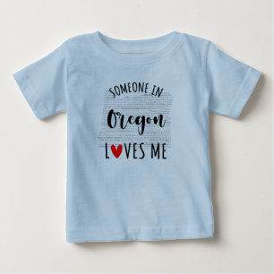 Alguém Em Oregon Me Ama A Camisa Do Bebê