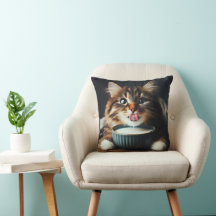 A tabby cat with sparkling eyes drinks delightfull