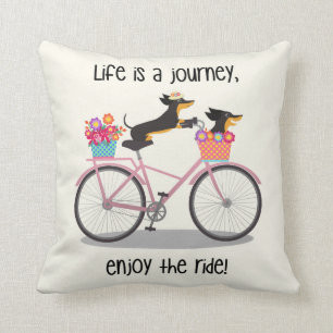 Almofada A vida é uma jornada que o Dachshund bota na bici