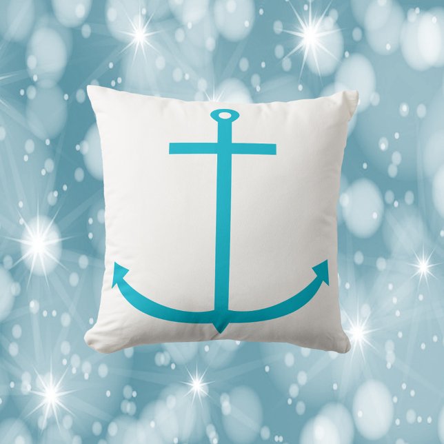 Almofada Azul-turquesa náutica ancorado (A throw pillow with a turquoise boat anchor)