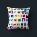 Almofada Azulejos de quadrados de alfabeto da Trendy<br><div class="desc">Os quadrados alfabetos coloridos de tendências em padrão repetido na almofada.</div>