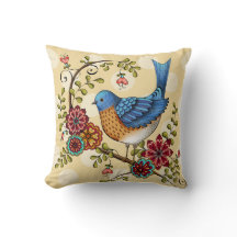 Bluebird com o travesseiro decorativo amarelo dos