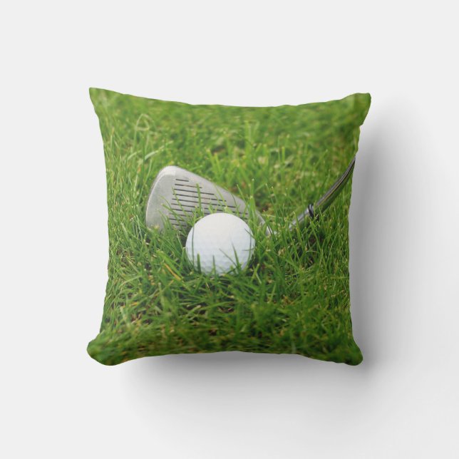 Almofada Bola de golfe, clube, ferro e grama verde (Frente)