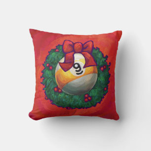 Almofada Bola nove na grinalda do Natal no vermelho