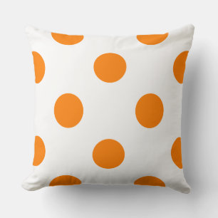 Almofada bolinhas em branco em laranja