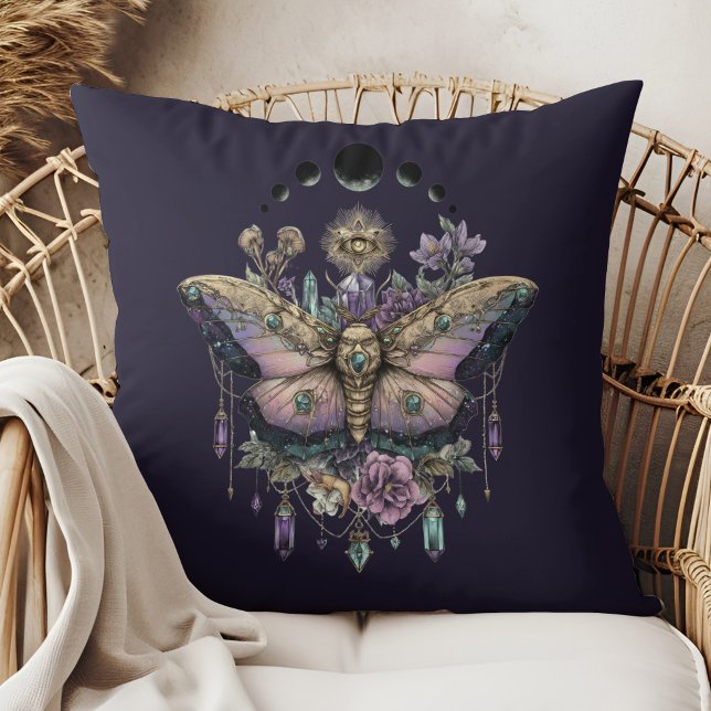 Almofada Celestial Mariposa Fases da Lua (Celestial Moth Moon Phases Throw Pillow in a boho rattan armchair)