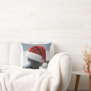 Almofada Chapéu de Papai Noel em uma Estaca de Cerca Nevada