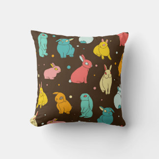Almofada Coelhos multicoloridos, diferentes, lebres num esc