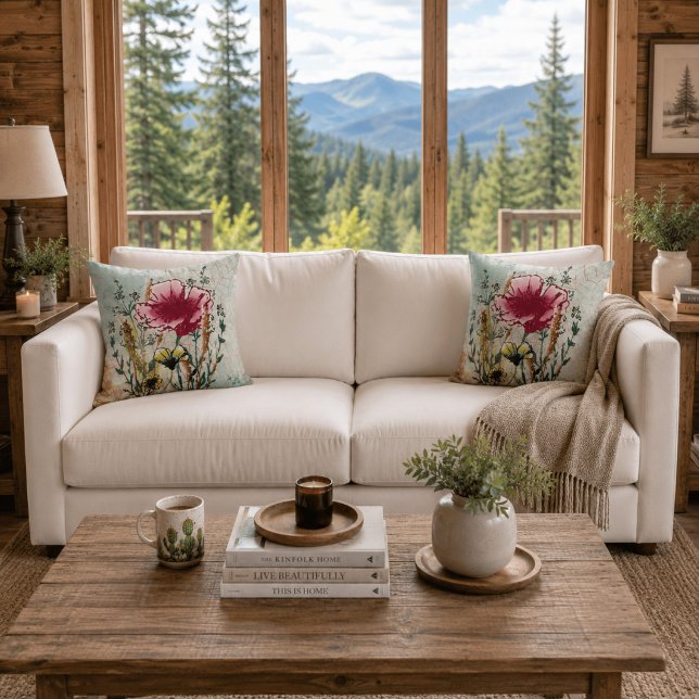 Almofada de Arremesso Botânica de Flor Silvestre (White sofa with matching wildflower botanical throw pillows in a bright contemporary cabin.)