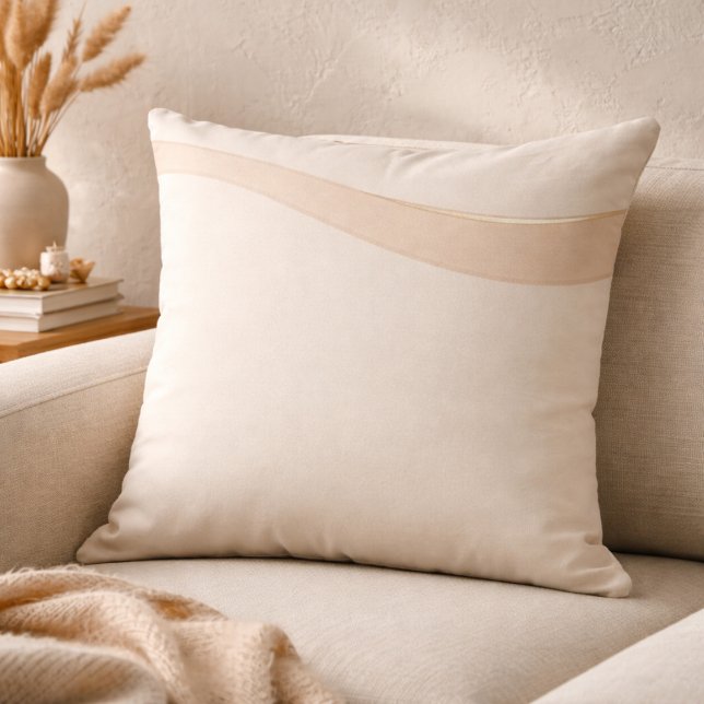 Almofada de lançamento neutra da onda de champanhe (Ivory and taupe waves with a champagne line for refined coastal layering)