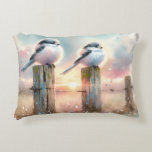 Almofada Decorativa Pastel Watercolor Birds Fencepost Sunset<br><div class="desc">Soft watercolor brushwork captures two fluffy songbirds resting on weathered fence posts as a glowing sunset spreads across a dreamy countryside sky. Gentle washes of peach, blush pink, pale blue, and warm gold blend into a tranquil horizon, creating a calm pastoral atmosphere. The birds appear round and feathery, their delicate...</div>