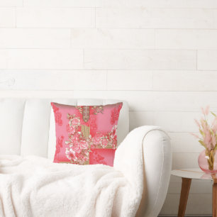 Almofada design de fundo rosa e ouro com vermelho