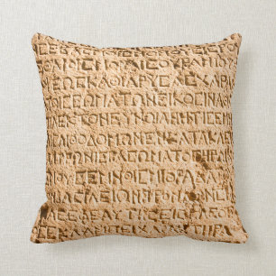 Almofada escrevendo grego antigo esculpido em pedra