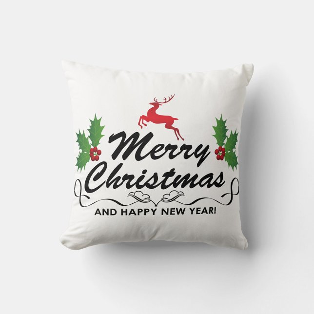 Almofada Feliz Travesseiro decorativo de Natal (A throw pillow with the words "Merry Christmas" in a decorative black font, with a red reindeer.)