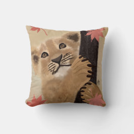 almofada filhote de leão brincando