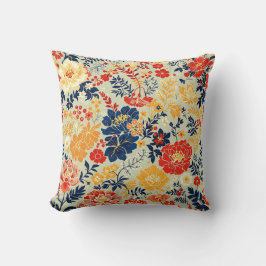 Almofada Flora vibrante vermelha, amarela e azul sobre o br