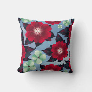 Almofada Floral Vermelho e Verde Mint sobre fundo azul-céu