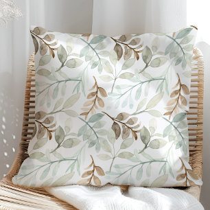 Almofada Folhas de aquarela verde e castanha sobre um branc