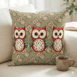 Almofada Folk Art Patchwork Owl Cottagecore<br><div class="desc">This charming folk art owl blends rustic whimsy with cozy cottagecore charm, featuring a beautifully stitched patchwork design inspired by nature and vintage quilting. The warm red, green, and cream tones, combined with delicate floral patterns, evoke the comforting feel of a handcrafted heirloom, perfect for lovers of woodland animals and...</div>