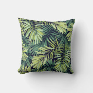 Almofada Fundo verde-claro com plantas tropicais. Seam