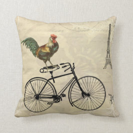 Almofada Galo do vintage que monta uma bicicleta pela torre