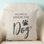 Almofada Home Is Where The Dog Is<br><div class="desc">This dog lover's throw pillow features a dog's paw print and reads,  "Home is where the dog is."</div>