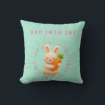 Almofada Hop Into Joy<br><div class="desc">Add festive charm to your home with the Hop Into Joy throw pillow! 🐰🥕✨ Featuring a cheerful bunny holding a carrot surrounded by pastel sparkles, this design brings playful Easter vibes to any space. Perfect for couches, nurseries, or seasonal décor, it combines cozy comfort with bright springtime style. Made with...</div>