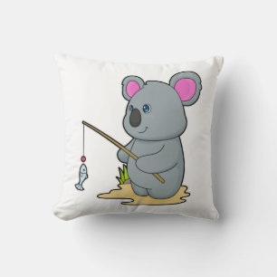 Almofada Koala como pescador com cana de pesca e peixe