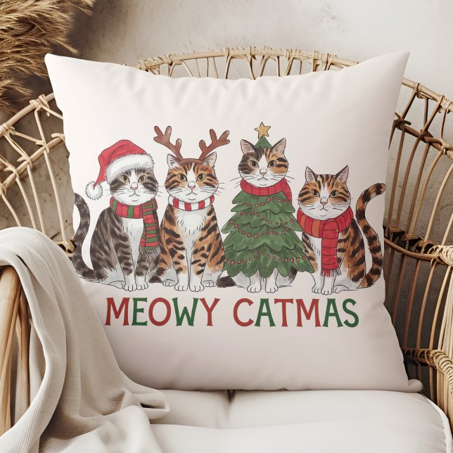 Almofada Meowy Catmas Funny Holiday Cats - Christmas Decor  (Meowy Catmas Funny Holiday Cats - Christmas Decor Throw Pillow in a boho rattan armchair.)