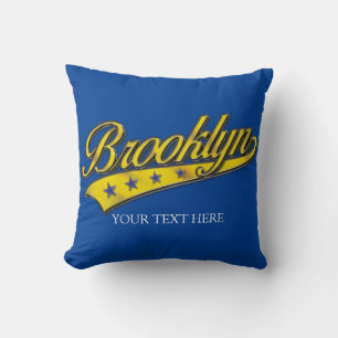Almofada Modelo Swoosh Dourado do Brooklyn