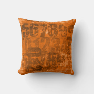 Almofada Números grandes na textura do dourado laranja acas