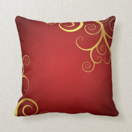 Almofada O ouro roda em vermelho escuro