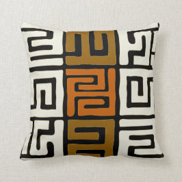 Almofada O pano de Kuba inspirou as cores de terra