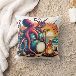 Almofada Octopus Drumming ao pôr do sol pela orla oceânica
