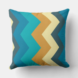 Almofada padrão chevron azul, turquesa, amarelo e lacrimogê