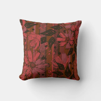 Almofada Padrão floral preto e vermelho.
